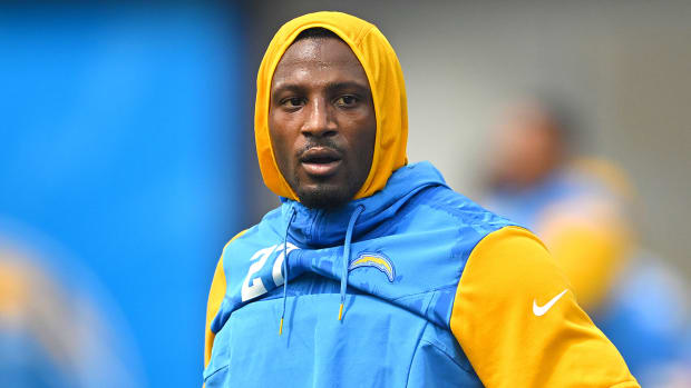Chargers cornerback J.C. Jackson (27) warms up before the game against the Raiders at SoFi Stadium.